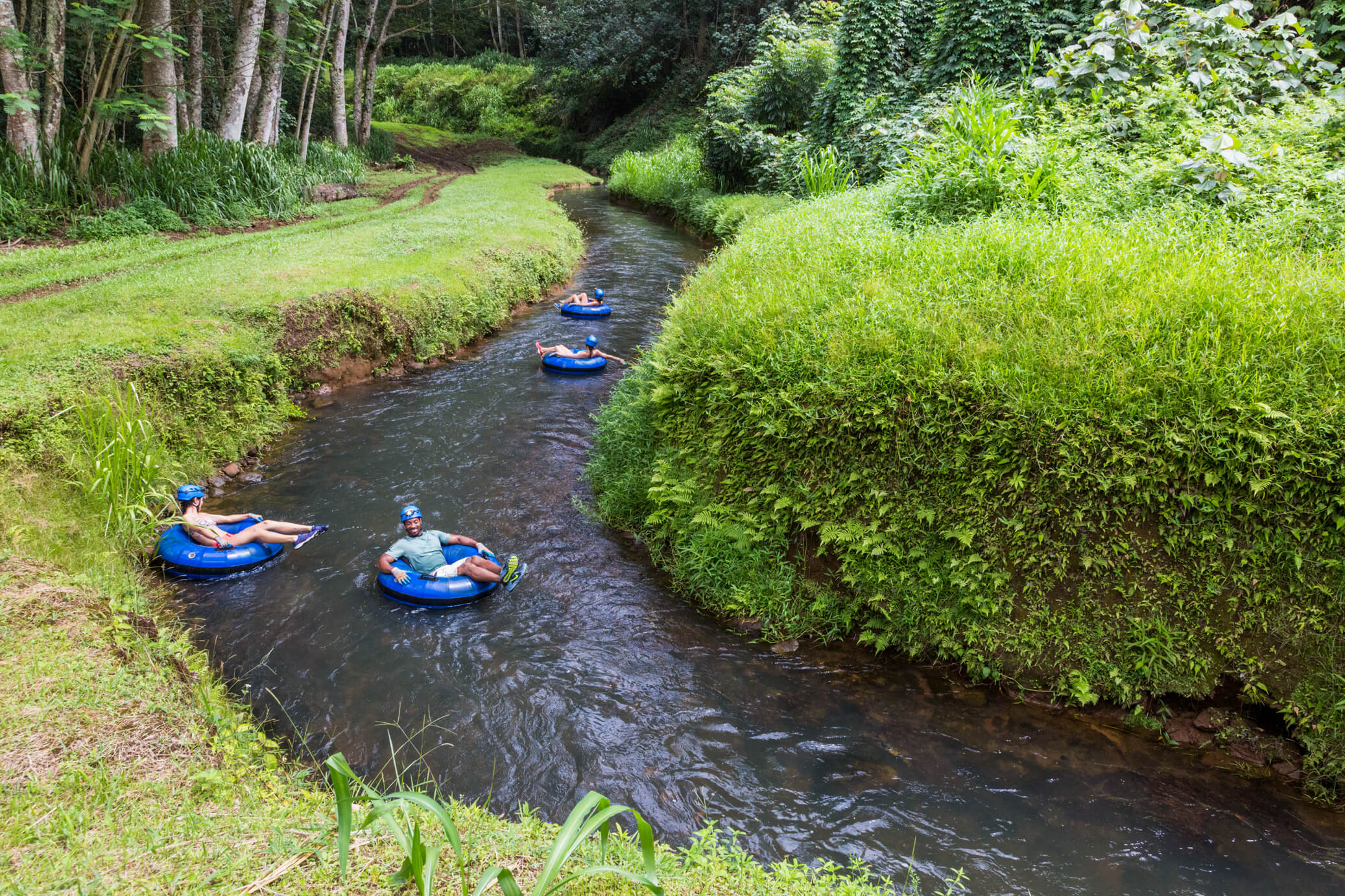 Group tubing on Kauaʻi Group tubing on Kauai