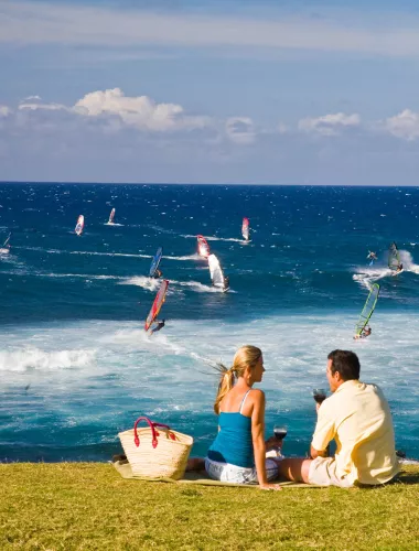 Couple enjoying a picnic overlooking the ocean