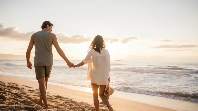 couple on the beach at sunset