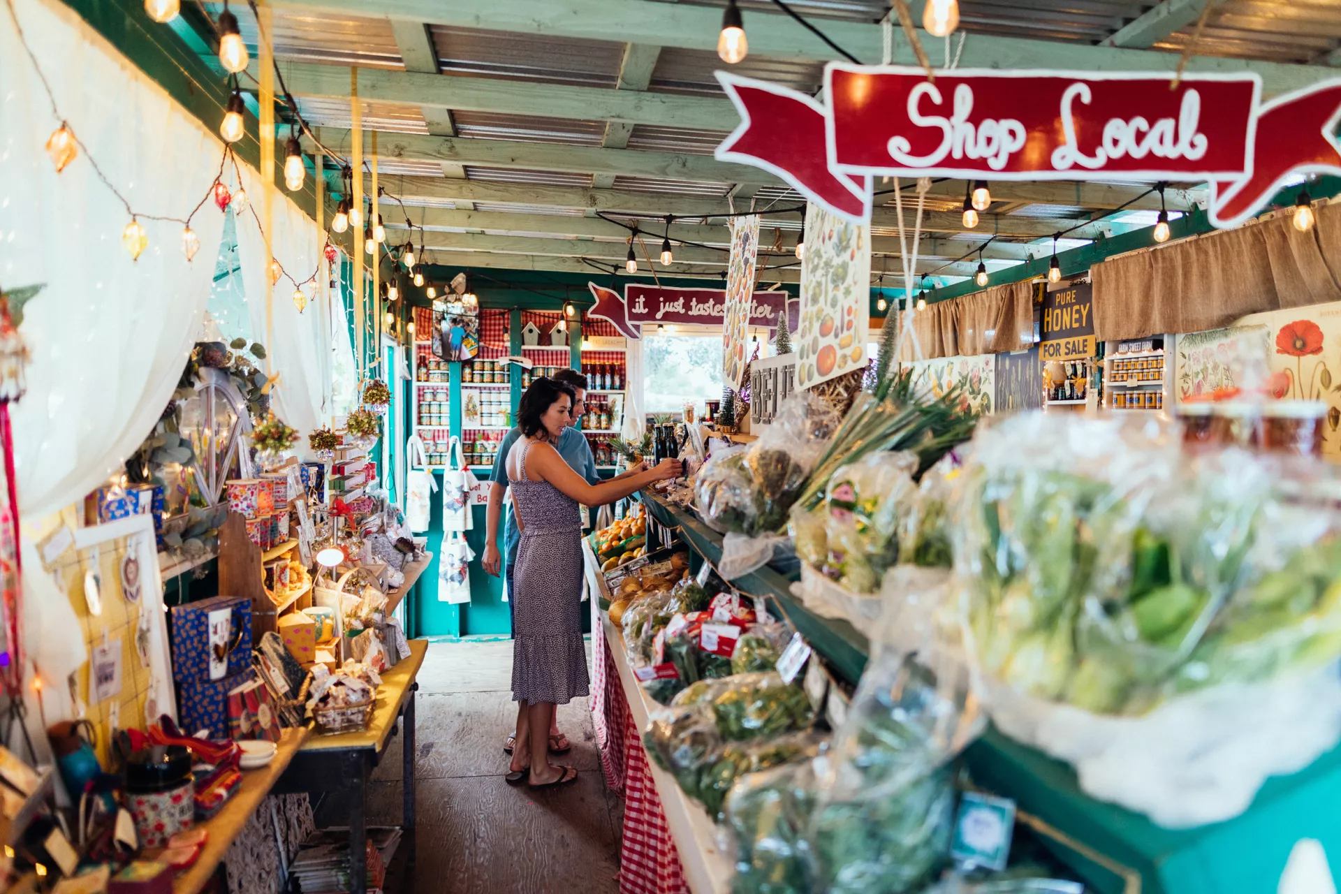 Local market with Shop Local sign on Maui