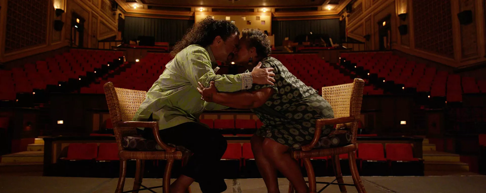 Kekuhi Kealiʻikanakaole chanting in theater in Hawaii