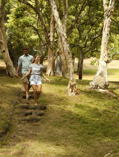 Couple walking a scenic path near Lānaʻi City in Hawaiʻi