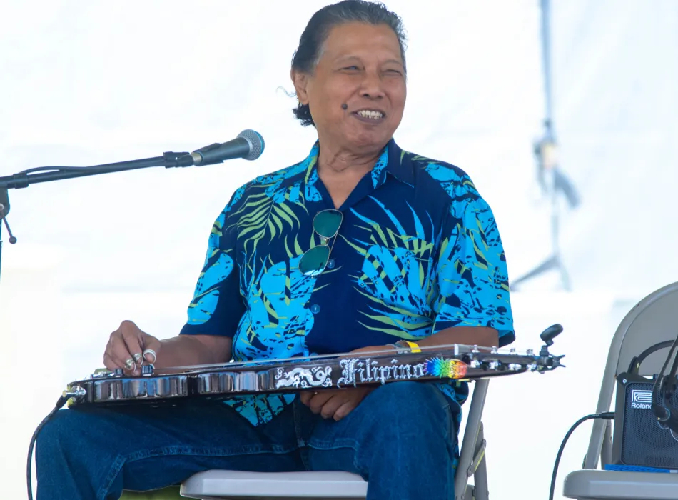 Steel guitar performance at ʻAʻala Park - photo by Kenneth Stringer