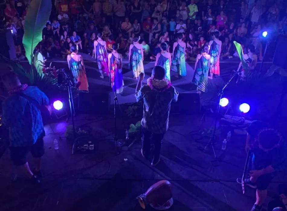 A hālau hula perform for crowd