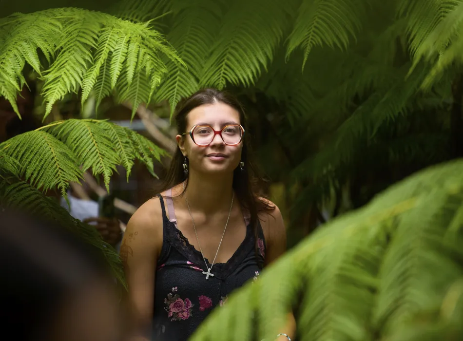 A festival goer enjoys an educational musical trail walk at the Volcano Art Center