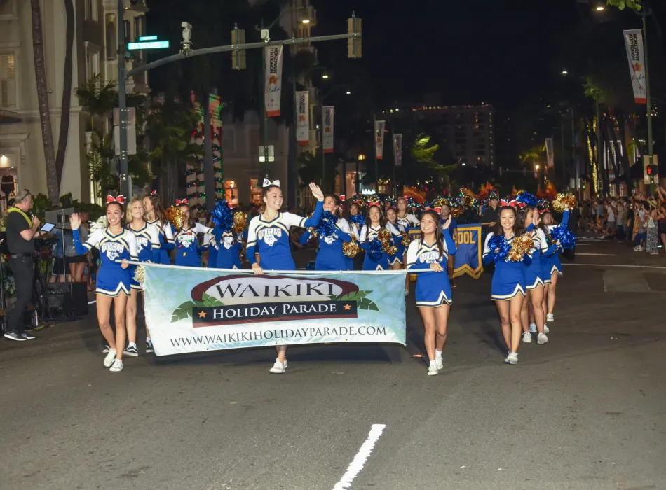 Kaiser High School Cheer kicking off the Waikiki Holiday Parade