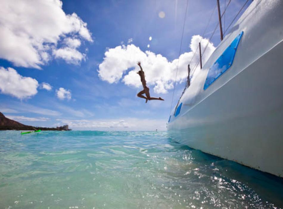 Diving off a boat in Oahu