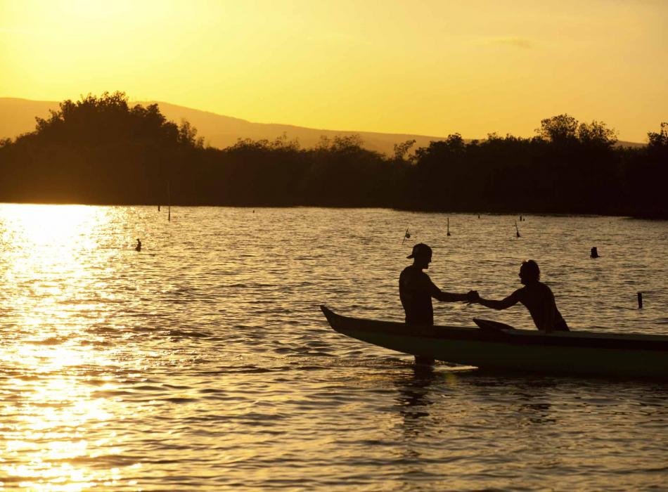 Kayaking at sunset off the coast of Molokai