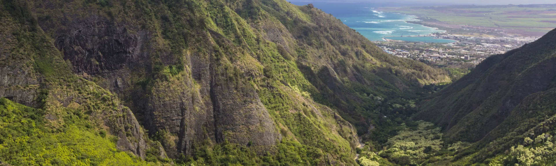 A scenic valley overlooking the water in Hawaii