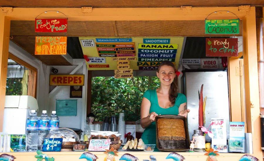 Woman working at a fruit stand Woman working at a fruit stand