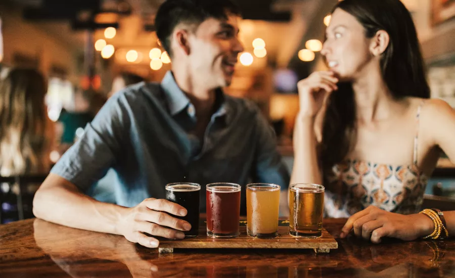 Couple enjoy pau hana at a local brewery Couple enjoy pau hana at a local brewery