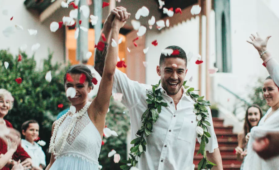 Newlyweds pass well-wishers after ceremony